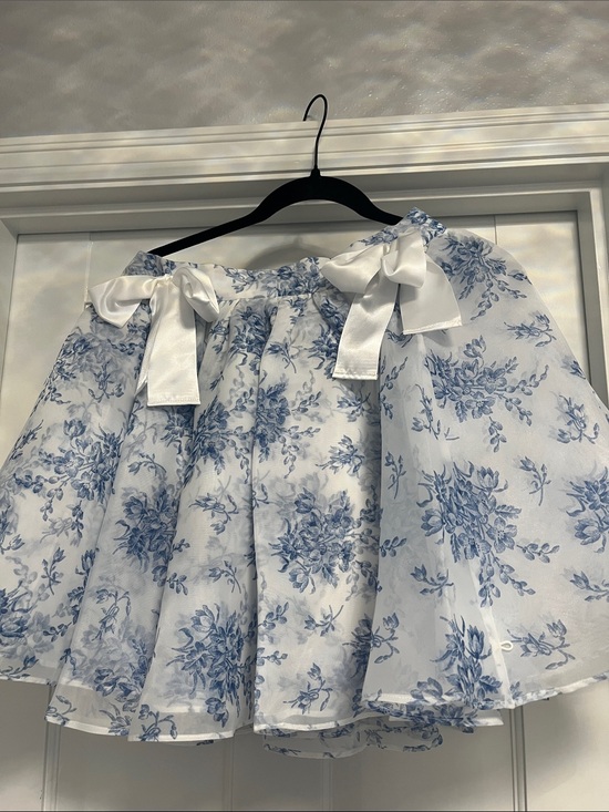 Selkie Dresses & Skirts - Selkie White and Blue Floral Mini Skirt with Ribbon Bows “Bed & Breakfast”